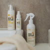 all products in the New Edition NZ Hand And Surface Sanitising Pack next to bathroom sink, including the adult foaming hand sanitiser, everything spray for surfaces and baby hand sanitiser spray